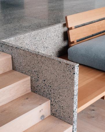The choice of materials is central to the character and finished quality of this house in the Western Isles. The interiors are defined by three: local-stone terrazzo, oak and clay plaster.
The terrazzo is used across the floor and to form a series of bespoke elements, including the back of the built-in sofa, hearth, kitchen worktops and bathroom vanity units.
Oak provides warmth and contrast, used for areas of flooring, the ceiling linking the main chambers, and throughout the built-in joinery, including the kitchen, doors and study.
The clay-block walls are finished in clay plaster, with micro-cement used within the shower rooms.
As with all our projects, the finished building is the result of close collaboration, shaped by the ambitions of the client and the skills of those involved in its delivery.
Contractor: @omacconstructionlimited, Stornoway
Internal joinery: @56northkitchens and @namongaston
Terrazzo: @skyestonestudio
Furnishings: @tangram_furnishers
Structural engineer: @narroassociates
Building services: @luths.services
Quantity surveyor: The Torrance Partnership
#scottisharchitecture #contemporaryarchitecture #terrazzo #clayblocks #oakinteriors