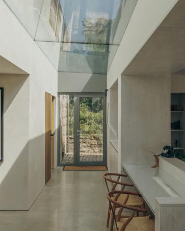 When our clients bought Bank Cottage on Bryher, they inherited a building that had been altered and extended many times over the years.
Somewhere underneath it all was a simple granite cottage, but it had become difficult to see, and the building itself was suffering badly from water ingress.
The idea was to strip away some of those later additions and let the original house breathe again. The granite walls were repaired and exposed, the roof raised slightly to make the upper floor properly usable, and a new timber extension set low into the garden.
A glazed link separates old from new, bringing light into the heart of the house, while larger openings connect the living spaces to the garden and the Atlantic beyond.
The palette is deliberately simple: restored granite and slate for the old house, with untreated timber and glass for the new. The timber will weather naturally, allowing the extension to settle into the extraordinary hedged landscape of Bryher.
Inside, clay plaster and breathable wall build-ups, together with a careful choice of finishes, help create a healthy internal environment.
The quality of the finish is testament to the ambition of our clients and the dedication and skill of builder Phil Spence and the craftspeople who took on the work.
And a wee nod to royalty too. The first planning application was withdrawn and redesigned to gain the consent of not only the planners but the then Duchy of Cornwall.
Thank you for the approval King Charles. We hope you like it.
Images: Richard Gaston @richardgaston
#Bryher #IslesOfScilly #BritishArchitecture #contemporaryarchitecture #modernrenovation
